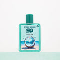 Hawaii Ting by Street Origins — teal bottle with coconut and ocean wave artwork