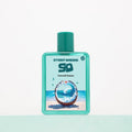 Hawaii Beau by Street Origins — teal bottle with coconut and ocean wave artwork